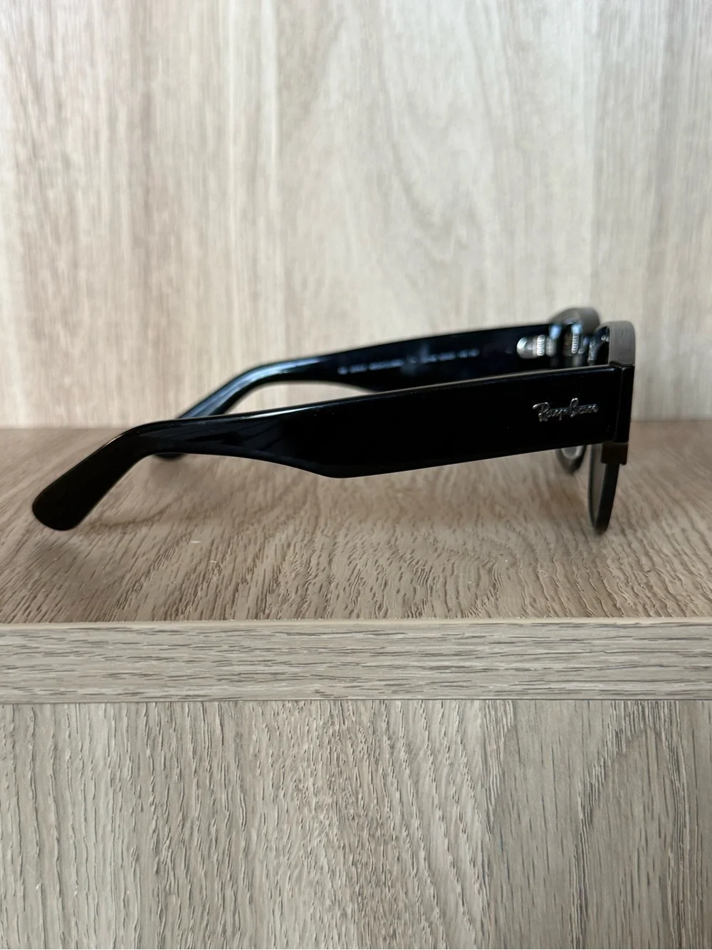Ray-Ban Black Frame Sunglasses with Dark Lenses